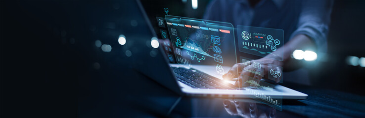 A laptop with graphics emitting from it
