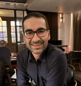 Samet Oymak headshot smiling at the camera