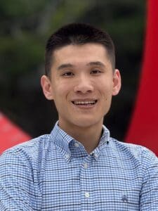 Man smiling at camera.