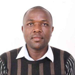 Man looking at camera with a stoic expression.