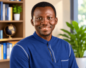 Headshot of Ali Abubakar in a Blue Shirt