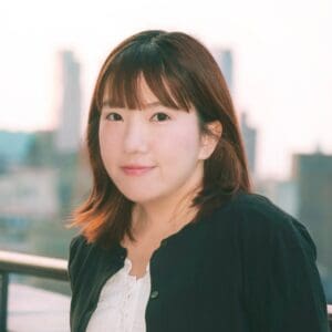 Outdoor portrait of a woman near a campus setting