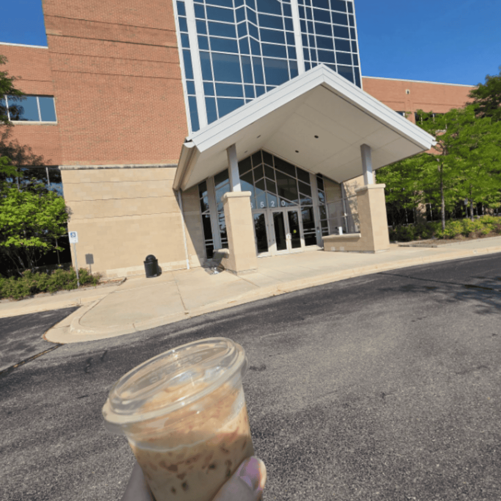 Green Court building for our Friday morning checkin-in / research seminar with a Dozer coffee in-hand.